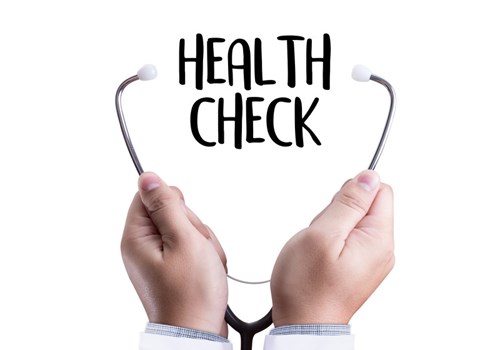Stethoscope being held by a male doctor for Health Check